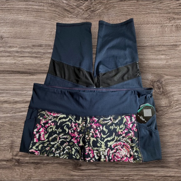 LuLaRoe Pants - LuLaRoe Navy and Floral Capris